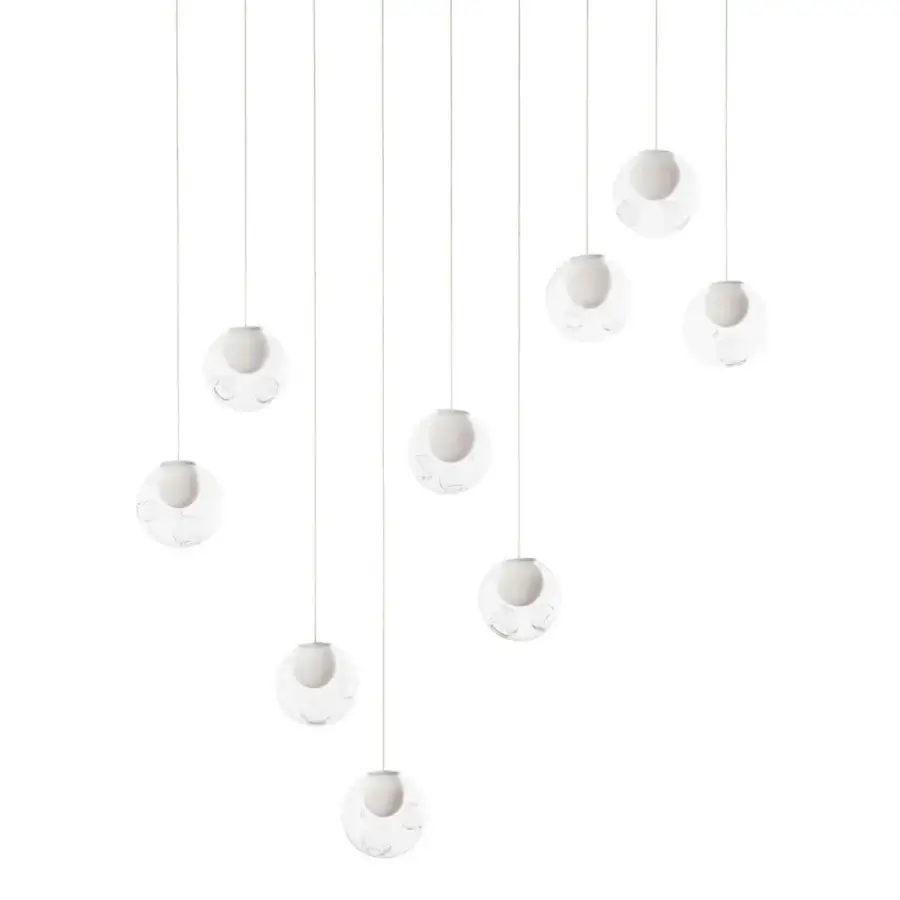 Exceptional Bocci 28 Linear suspension lamp crafted in clear glass with milk white interior lamp holder cavities and delicate cords