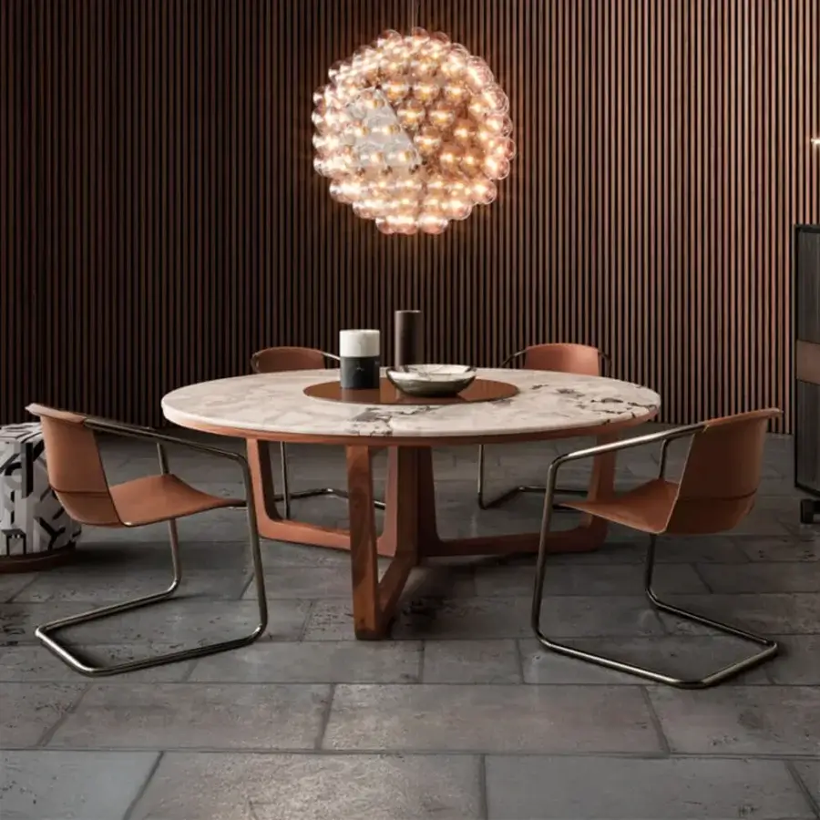 Distinguished 4 Mariani Nancy chair with chromed tubular steel frame and saddle leather in a warm reddish-brown satin finish