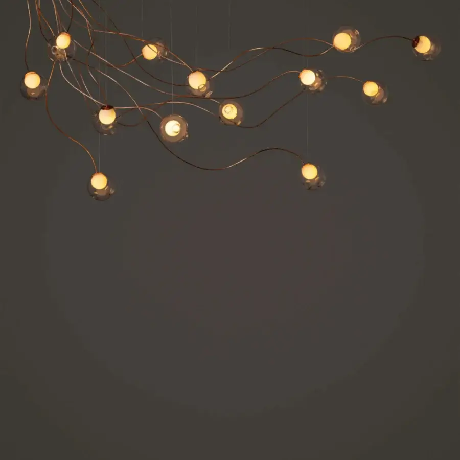 Superior Bocci 28 sculptural cable lamp with sprawling form and satin-finish metal alloy with clear glass exterior