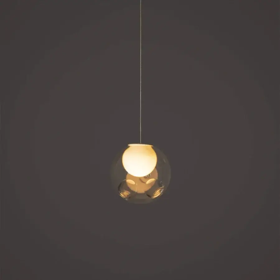 Elegant Bocci 28 single suspension lamp with clear glass exterior and milk white interior lamp holder cavity