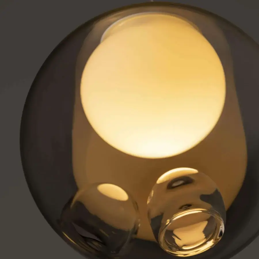 Exceptional Bocci 28 single suspension lamp crafted in clear glass with a milk white interior and glossy finish