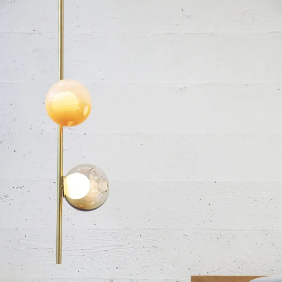 Elegant Bocci 28 Stem Ceiling Lamp with gradient pale orange to clear glass spheres and brass finish