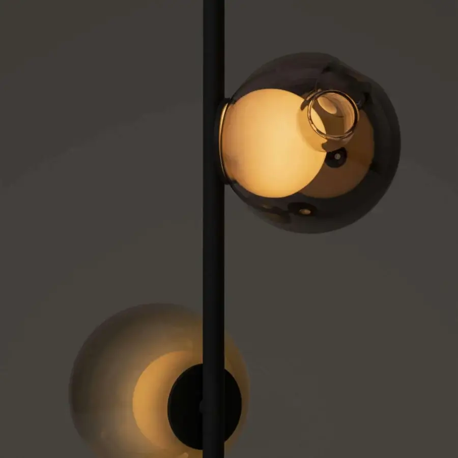 Exclusive Bocci 28 Stem Floor Lamp with a slender matte black metal stem and distorted smoky glass shades