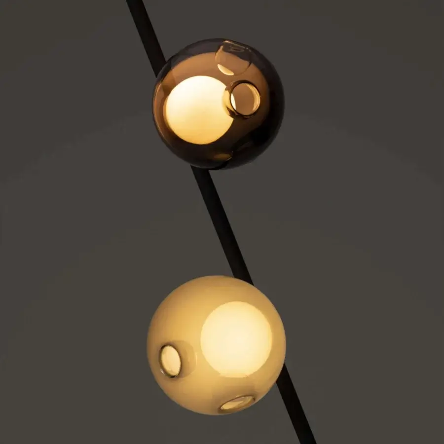 Exceptional Bocci 28 Stem Floor to Ceiling Lamp with dark matte metal and hand-blown amber and clear golden glass shades