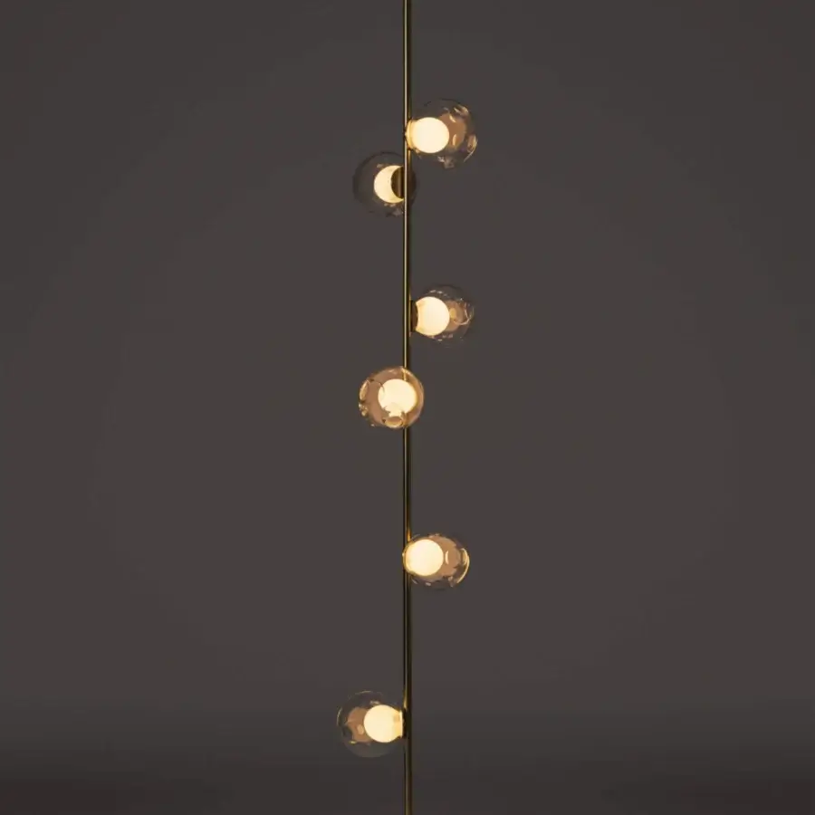 Exceptional Bocci 28 Stem Floor to Ceiling Lamp with warm brass and clear glass exterior spheres crafted in a refined metal finish