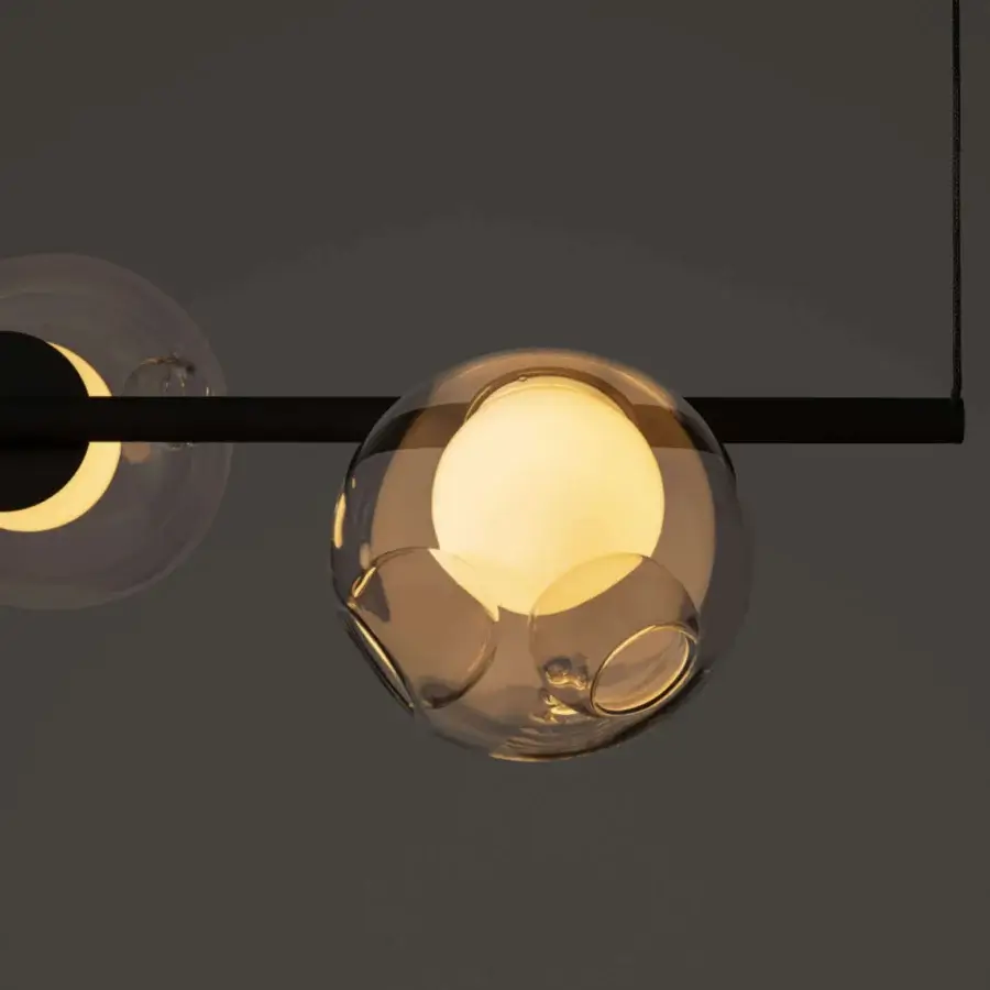 Exceptional Bocci 28 Stem suspension lamp with hand-blown clear glass spheres and unlacquered brass stem structure