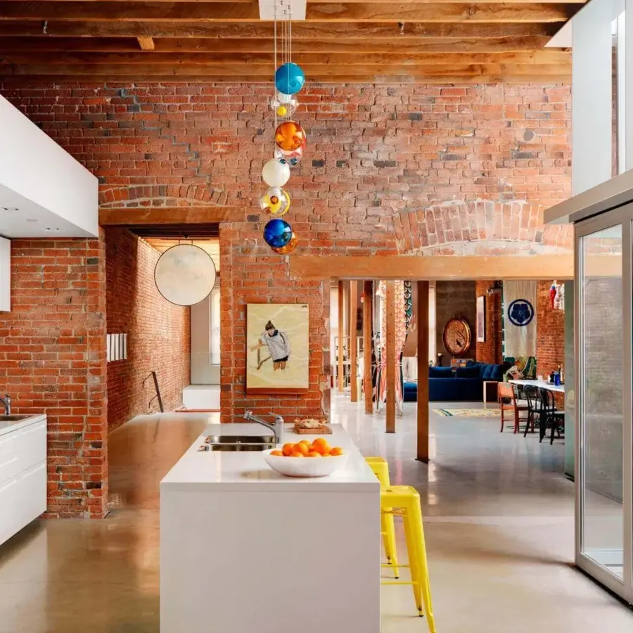 Exceptional Bocci 28 Random suspension lamp crafted with clear glass, milk white interiors, and vibrant blue, orange, yellow compositions