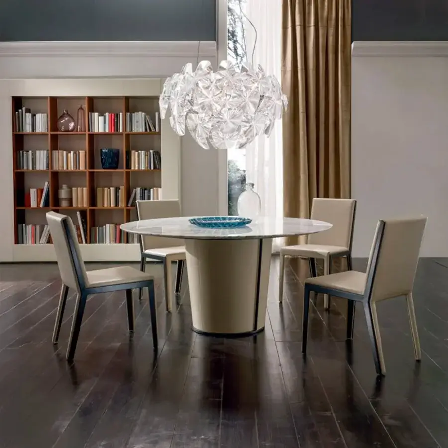 Distinguished 4 Mariani Papier table with grey veined marble tabletop and supple saddle leather curved base exhibiting a polished finish