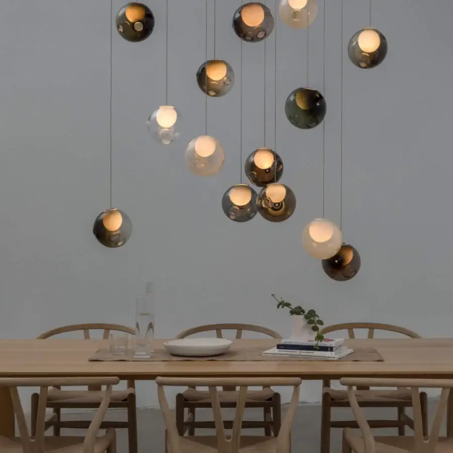 Distinguished Bocci 28 Random suspension lamp crafted in clear glass with milk white interior and satin metal canopy