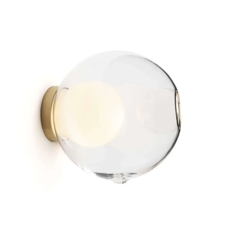 Captivating Bocci 28s lamp built in clear glass with a milk white interior and satin gold-toned metal mounting