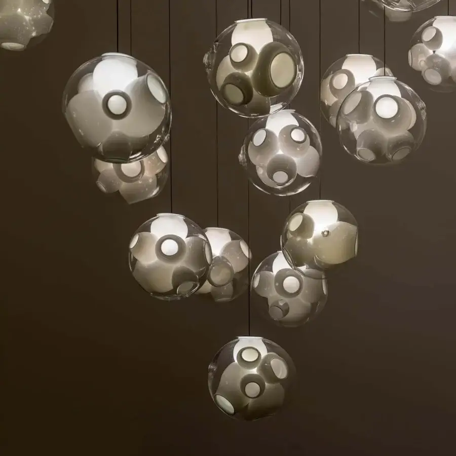Superior Bocci 38V Single Suspension Lamp lighting fixture crafted in clear glass with milk white interior lamp holder cavities