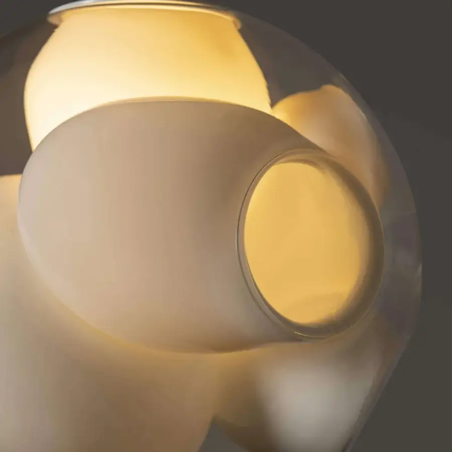Elegant Bocci 38V Single Suspension Lamp lighting with clear glass exterior and milk white interior cavities plus glossy finish