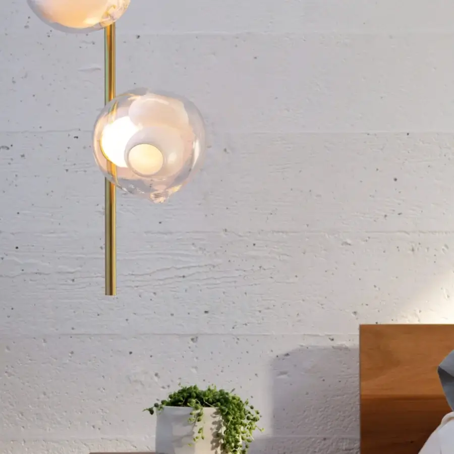 Superior Bocci 38V Stem ceiling lamp with a slender brass stem supporting clear glass spheres and milk white lamp holders