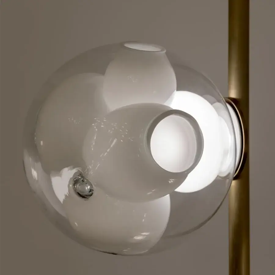 Lavish Bocci 38V Stem floor lamp crafted with clear glass exterior and milk white interior in a refined brass finish
