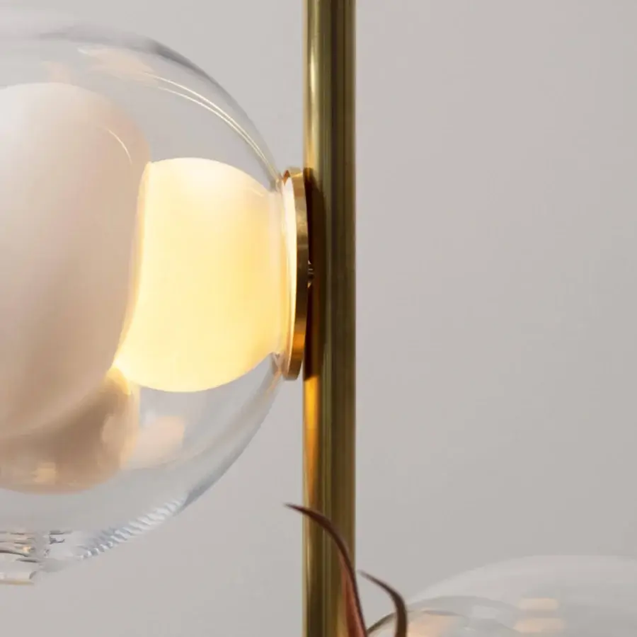 Distinguished Bocci 38V Stem floor lamp with clear glass exterior and milk white interior lamp holder cavities in polished gold brass