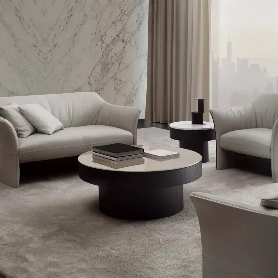 Lavish 4 Mariani Sella lounge chair with soft light gray textile upholstery and continuously enveloping form