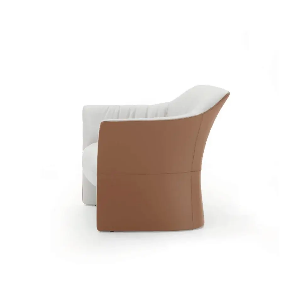 Exceptional 4 Mariani Sella lounge chair with sinuous silhouette crafted in warm brown leather and off-white internal padding