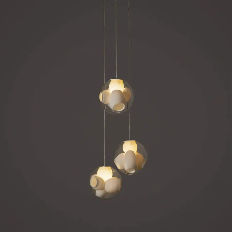 Captivating Bocci 38V Suspension Lamp with clear glass exterior and milk white lamp holder cavities within a spherical enclosure
