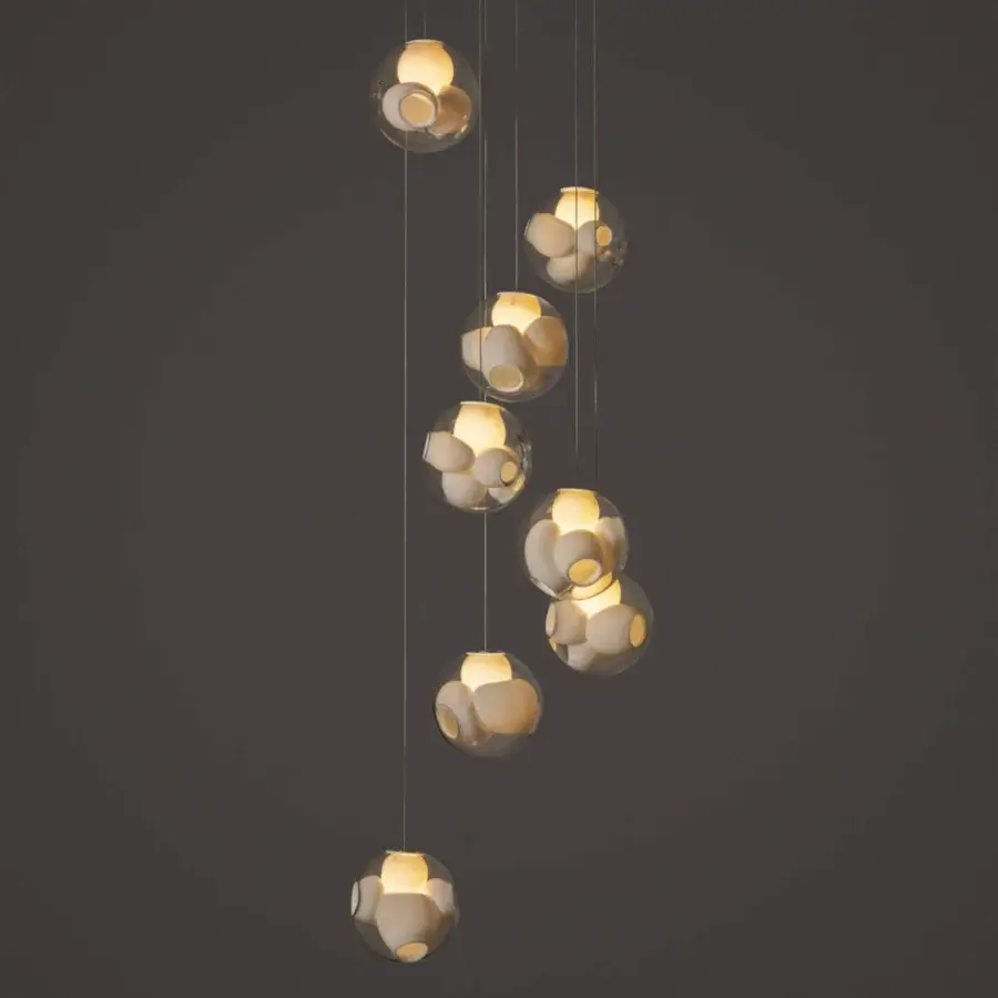 Elegant Bocci 38V Suspension Lamp with hand-blown clear glass spheres and milk white interior cavities along coaxial cables