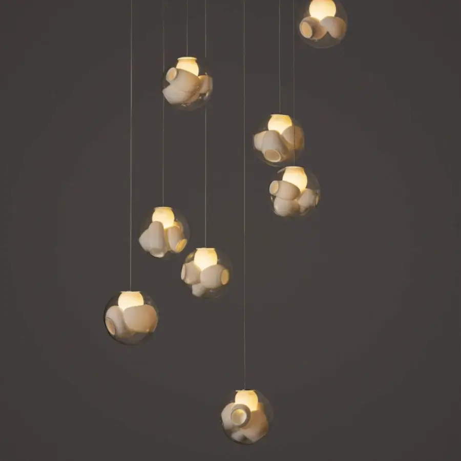 Superior Bocci 38V Suspension Lamp with cascading hand-blown clear glass spheres and uniquely sculpted milk white interiors
