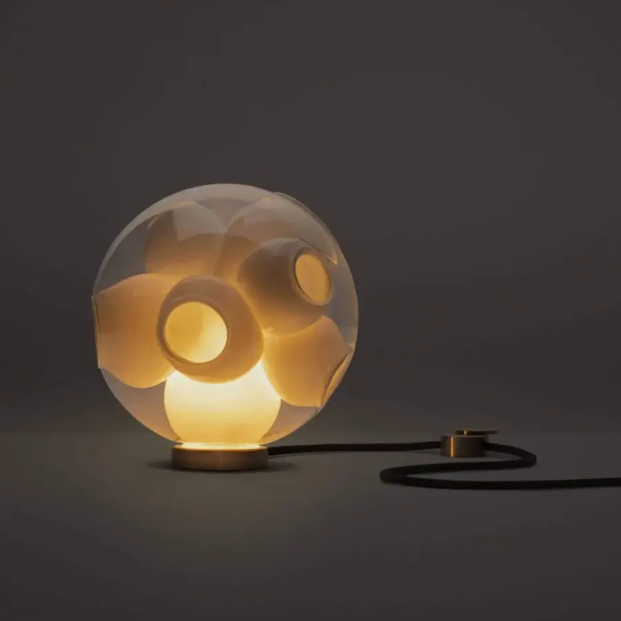 Distinguished Bocci 38V Table Lamp with clear glass exterior and milk white interior cavities crafted in refined brass