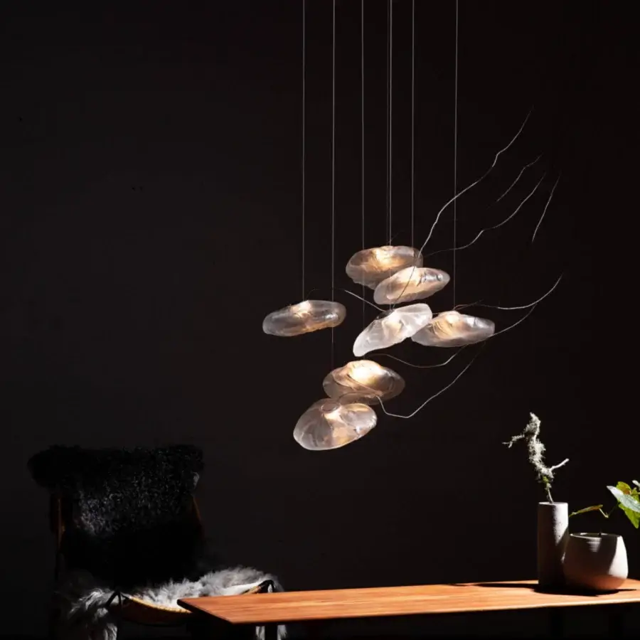 Distinguished Bocci 73 sculptural cable suspension lamp with warm amber translucent shades and satin finish