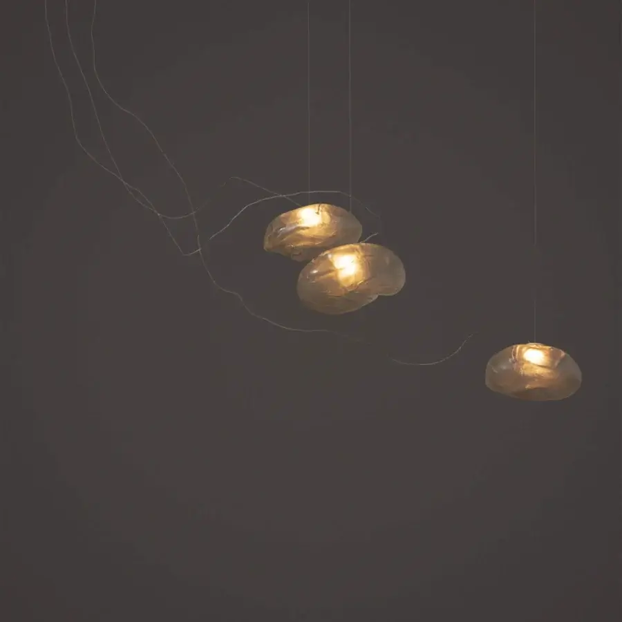 Superior Bocci 73 sculptural cable suspension lamp with organically shaped translucent blown glass shades and braided metal coaxial cable