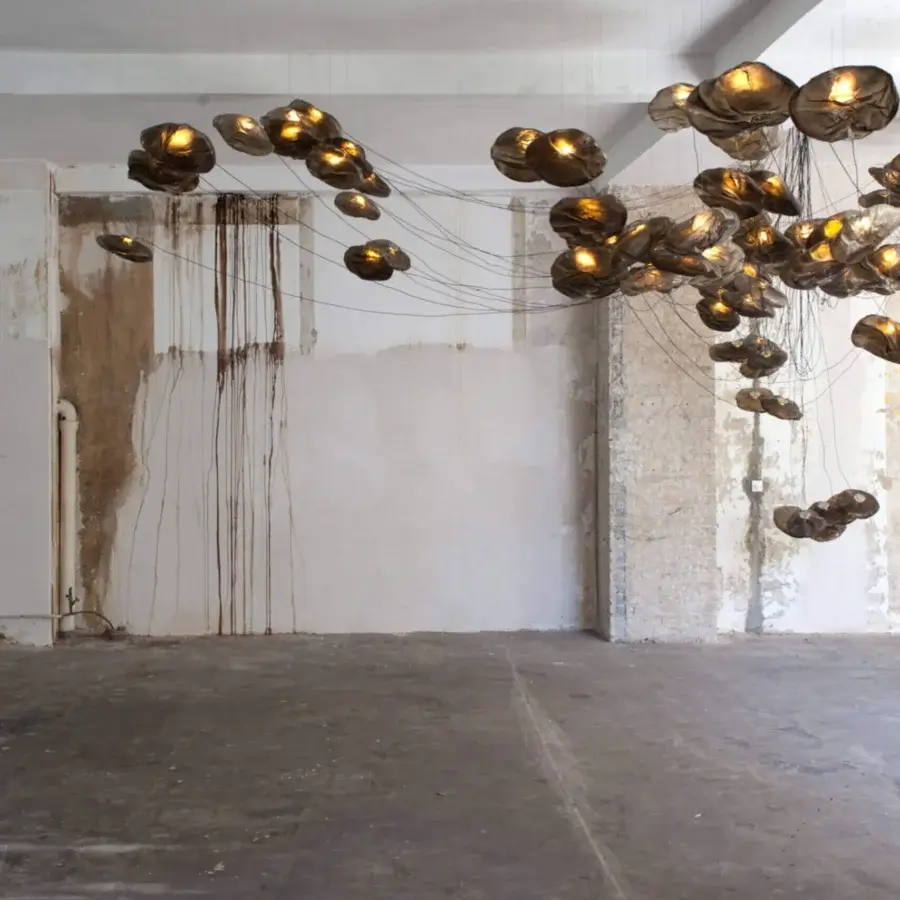 Exceptional Bocci 73 sculptural cable suspension lamp with golden-brown translucent blown glass and braided metal coaxial cable