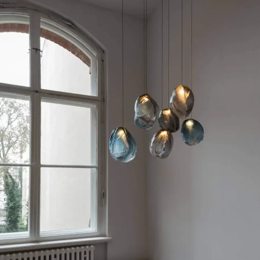 Captivating Bocci 73V single suspension lamp crafted in molten glass with blue gradient and brushed nickel canopy