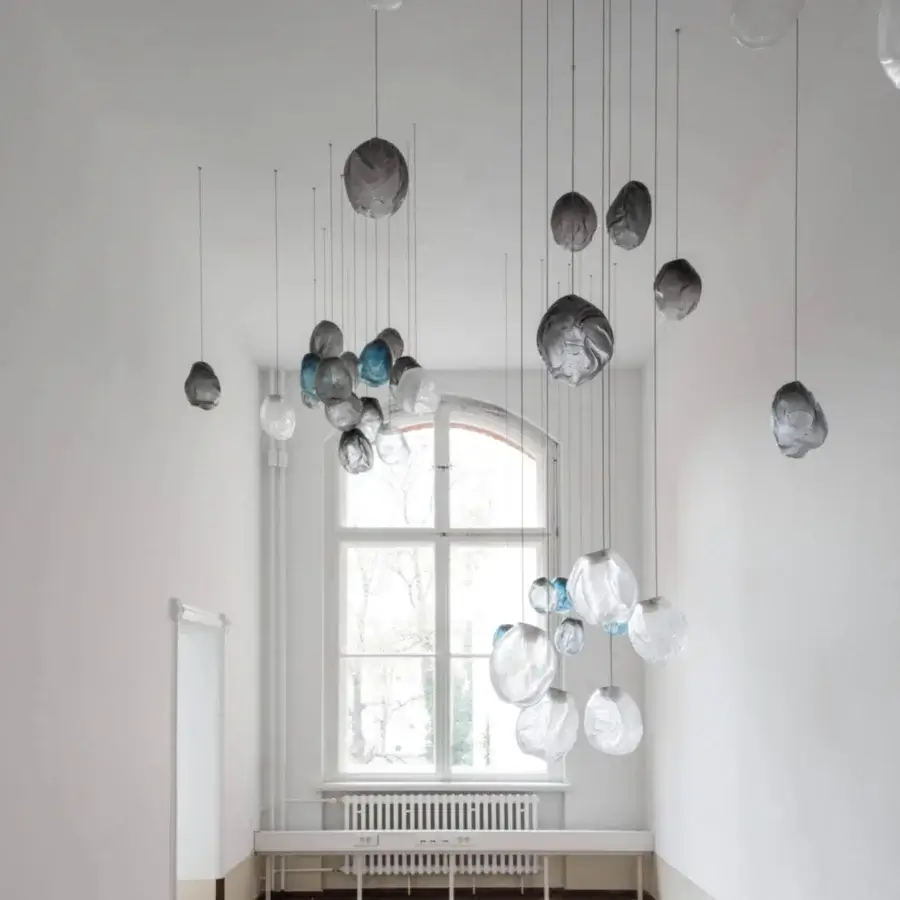 Distinguished Bocci 73V single suspension lamp crafted in clear glass with braided metal coaxial cable and brushed nickel canopy