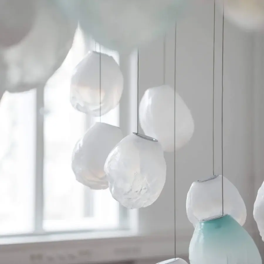 Elegant Bocci 73V single suspension lamp crafted in translucent pale aqua glass with a subtly textured matte finish