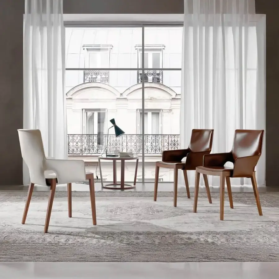 Superior 4 Mariani Shu chair with saddle leather seat and graphite-stained ash wood frame presenting a contemporary style