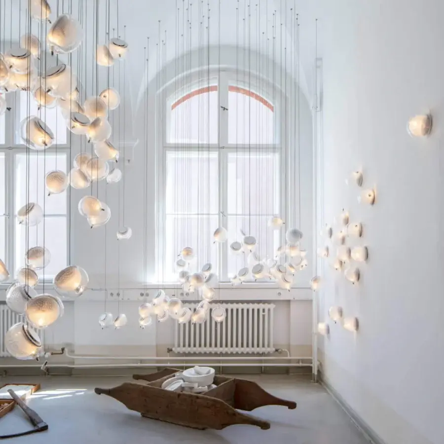 Exceptional Bocci 76 Single Suspension Lamp with hot white and clear glass plus delicate copper mesh detailing