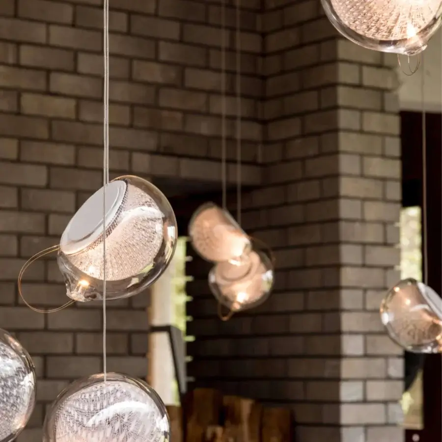 Distinguished Bocci 76 Single Suspension Lamp crafted in hot white and clear glass with copper mesh detailing and a silvery-grey finish