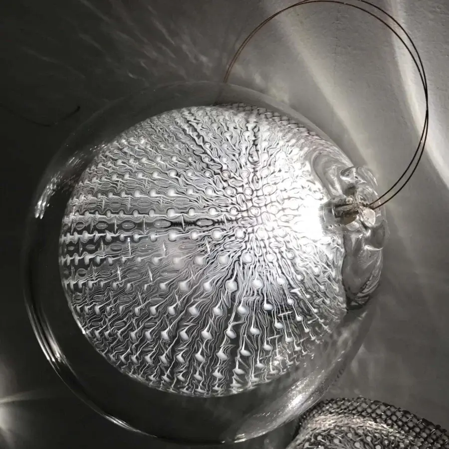 Exceptional Bocci 76 Surface Light crafted in hot white and clear glass with delicate copper mesh detailing and glossy finish
