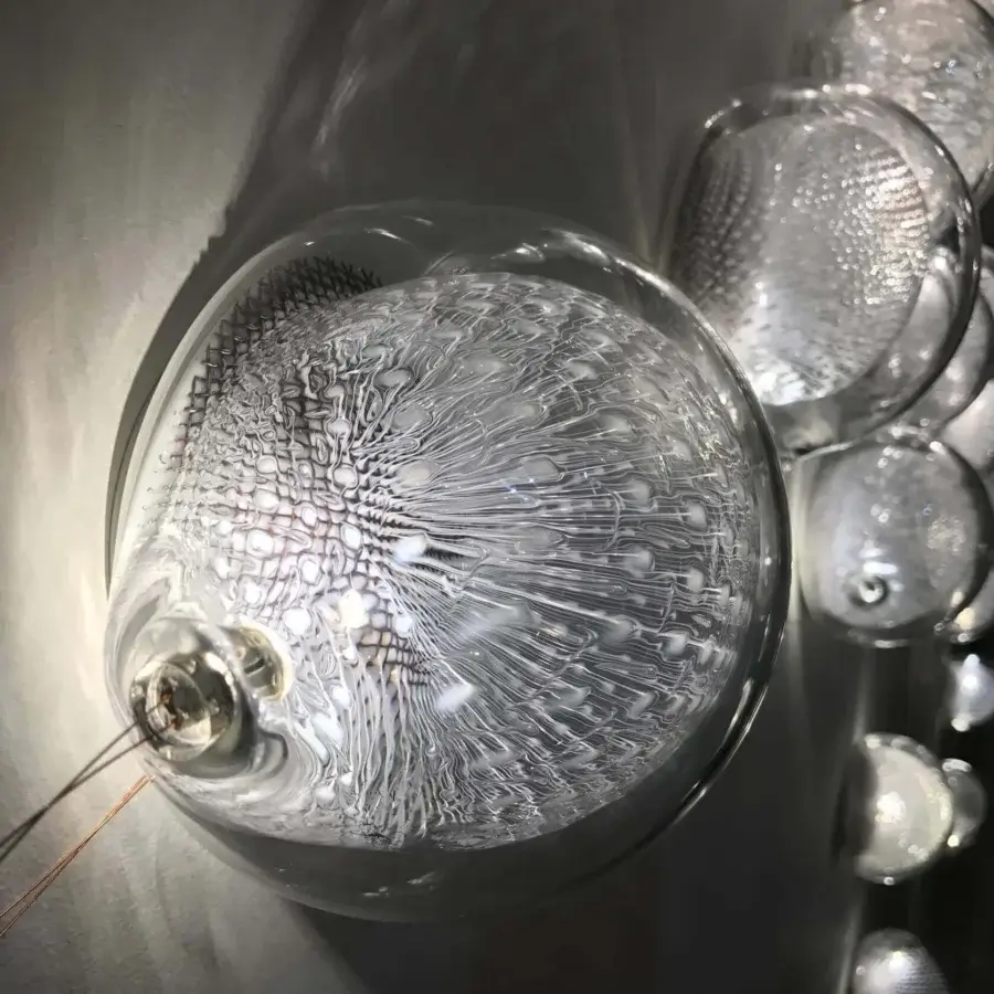 Superior Bocci 76 Surface Light fixture crafted in hot white and clear glass with delicate suspended tendrils and glossy finish