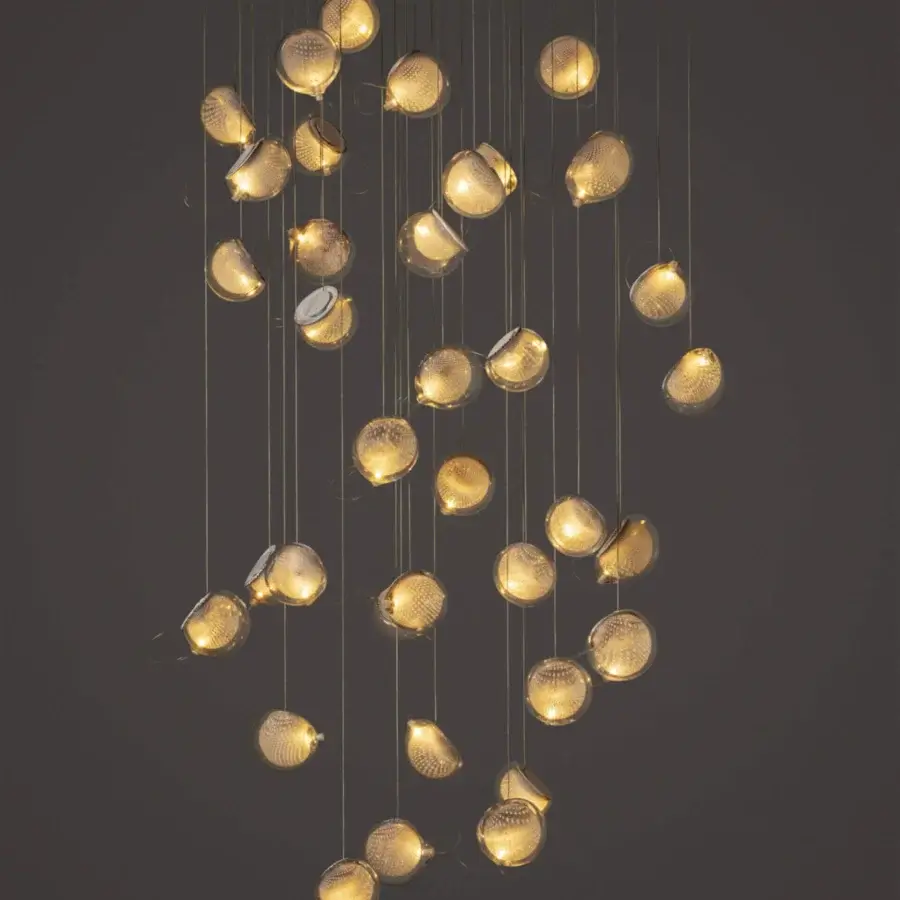 Exceptional Bocci 76 Random suspension lamp crafted in hot white and clear glass with delicate copper mesh detailing and white powder-coated canopy