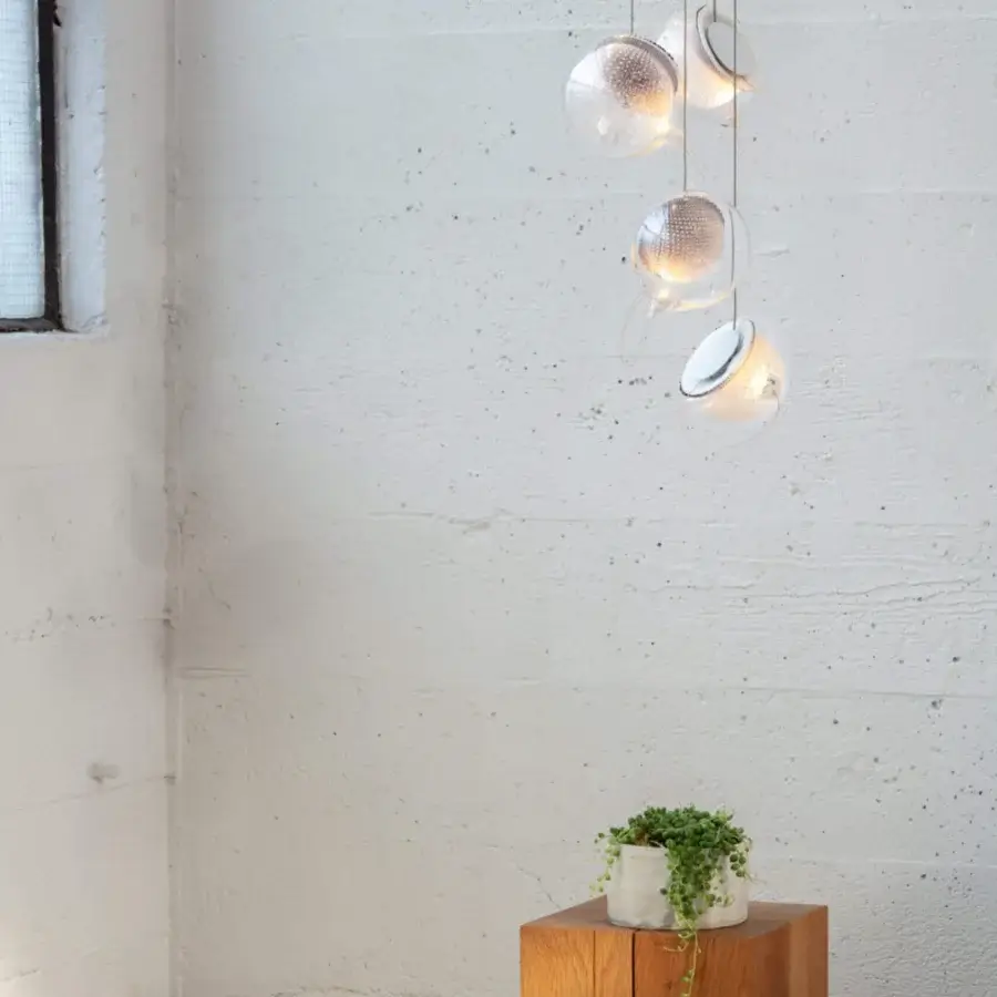Exceptional Bocci 76 Random suspension lamp with hand-blown hot white and clear glass plus delicate copper mesh detailing and silver finish