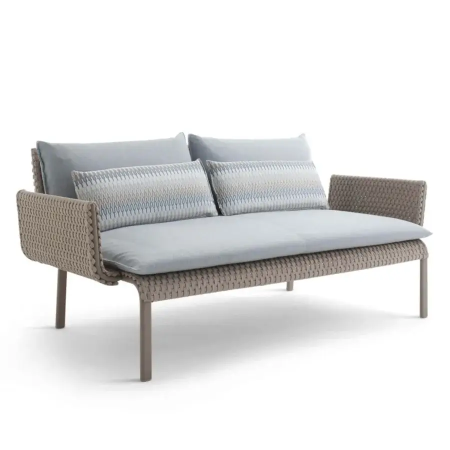 Elegant Roberti Rattan Key West sofa with light gray cushions and durable Sunrope woven around a Cipria powder-coated aluminum structure