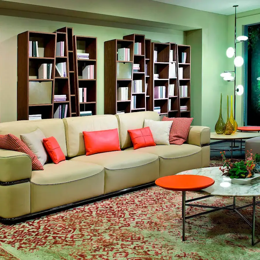 Distinctive 4 Mariani Twibe sofa with pale beige textile upholstery and vibrant red accent cushions crafted in Italy