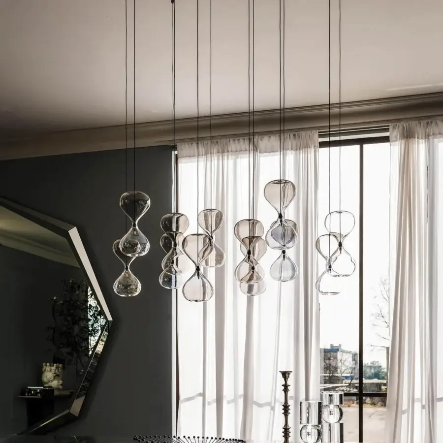Distinguished Cattelan Italia Sablier suspension lamp in clear glass with polished metallic ceiling plate and subtle black cables