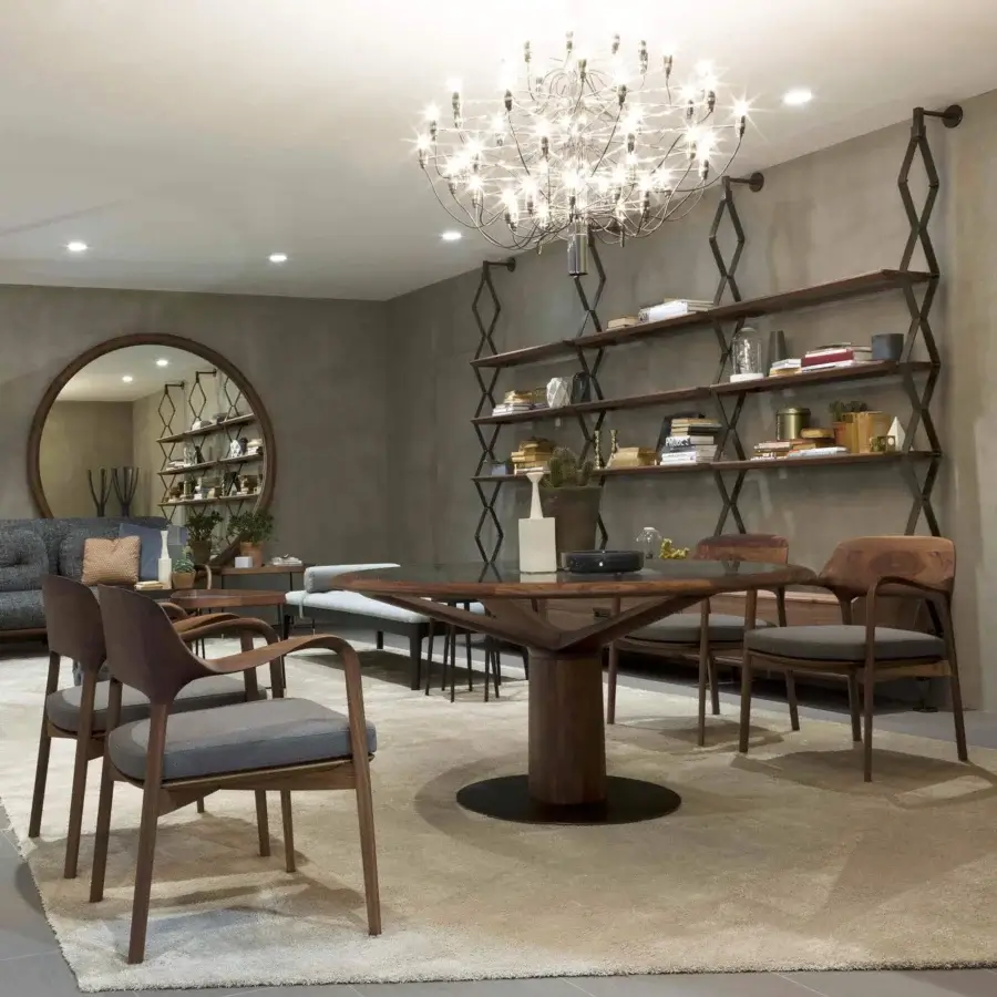 Sophisticated Porada Ella armchair with solid Canaletto walnut frame and muted gray textile seat cushion in matte finish
