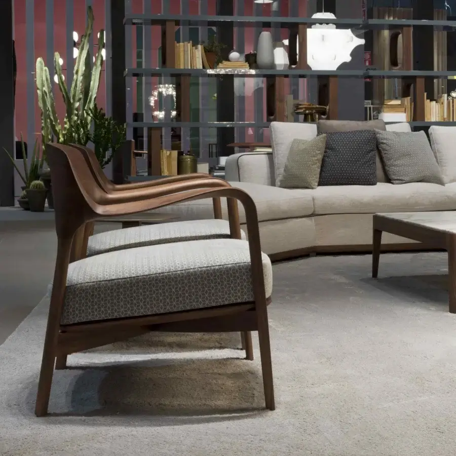 Exceptional Porada Louis lounge chair with Canaletto walnut frame and patterned cool gray cushion in matte finish