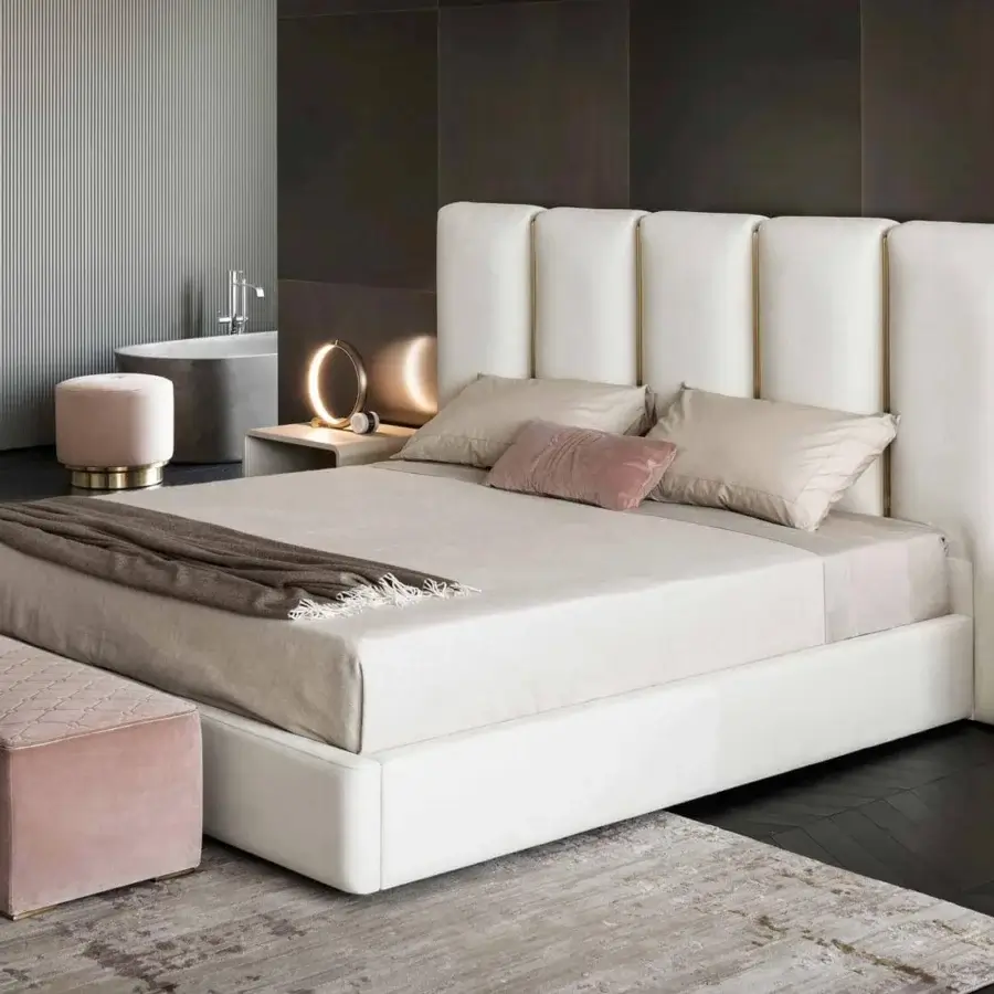 Refined Rugiano Club dresser crafted in off-white leather with brushed brass handles and a thin metal band base