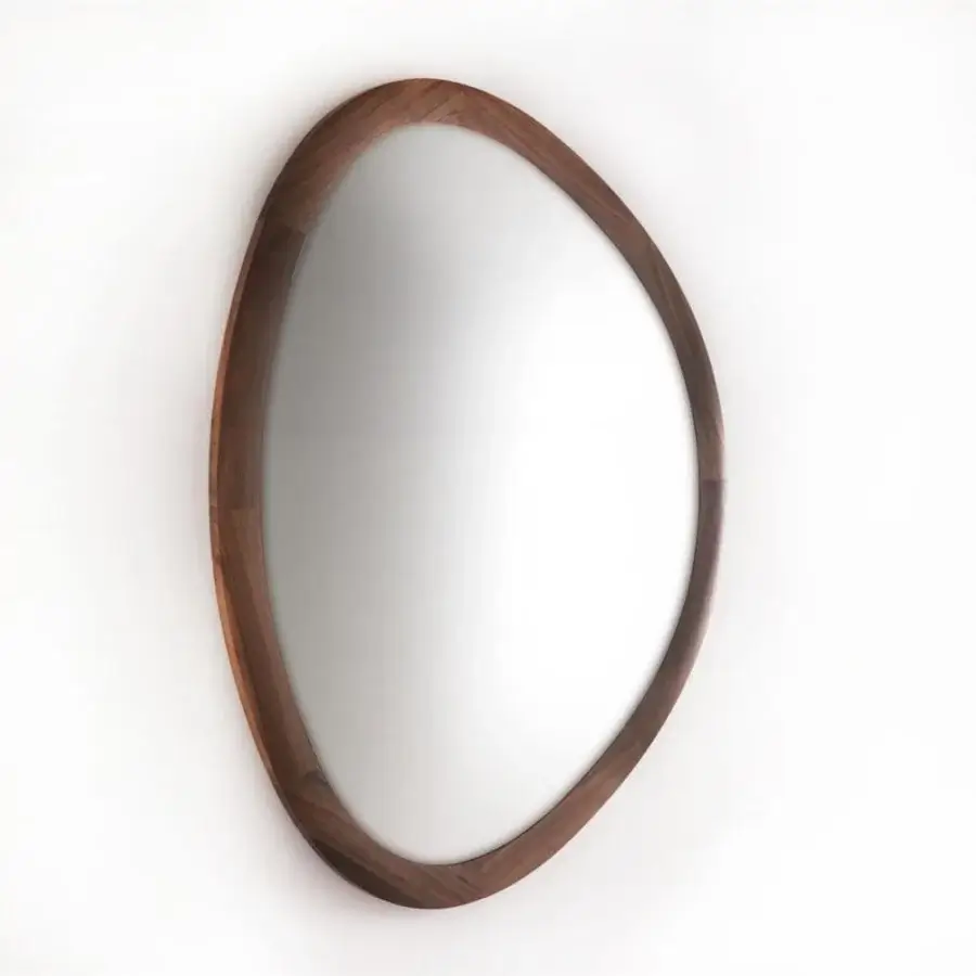 Elegant Porada Giolo mirror with organic oval silhouette in smooth solid Canaletto walnut and reflective glass