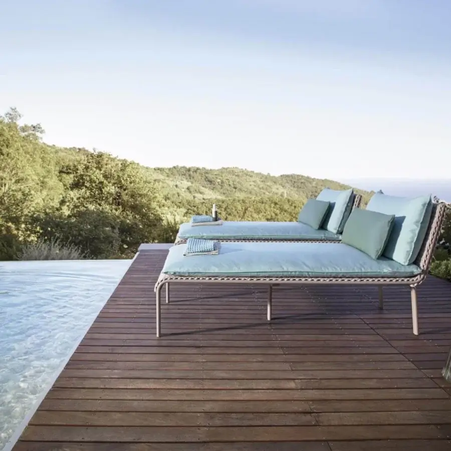 Exclusive Roberti Rattan Key West lounger with light-toned Sunrope weaving and powder-coated aluminum structure