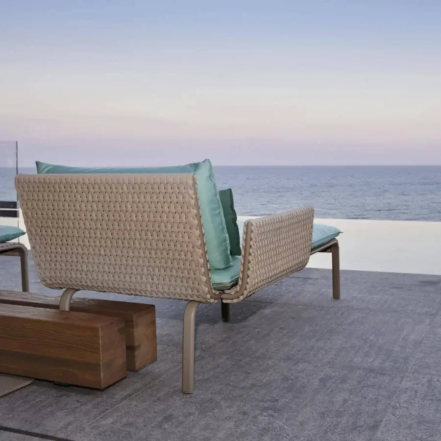 Superior Roberti Rattan Key West lounger with light beige Sunrope and powder coated aluminum construction, exhibiting a textured matte finish