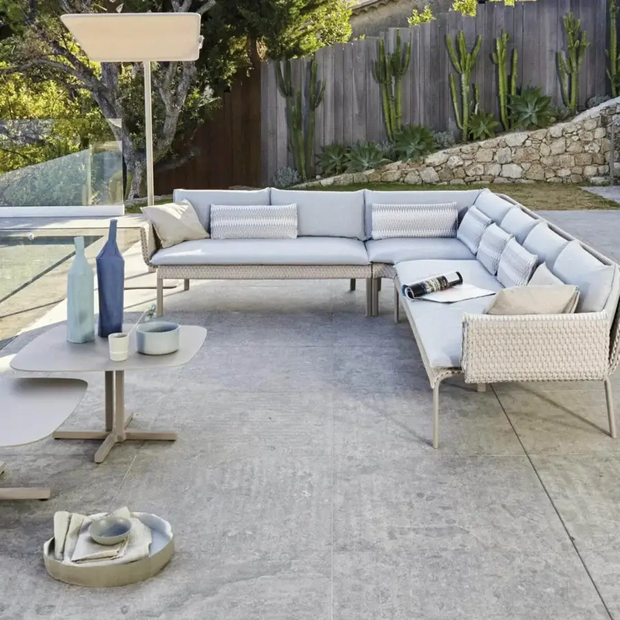 Superior Roberti Rattan Key West coffee table with Cipria powder-coated aluminum structure and flattened oval top crafted in Italy