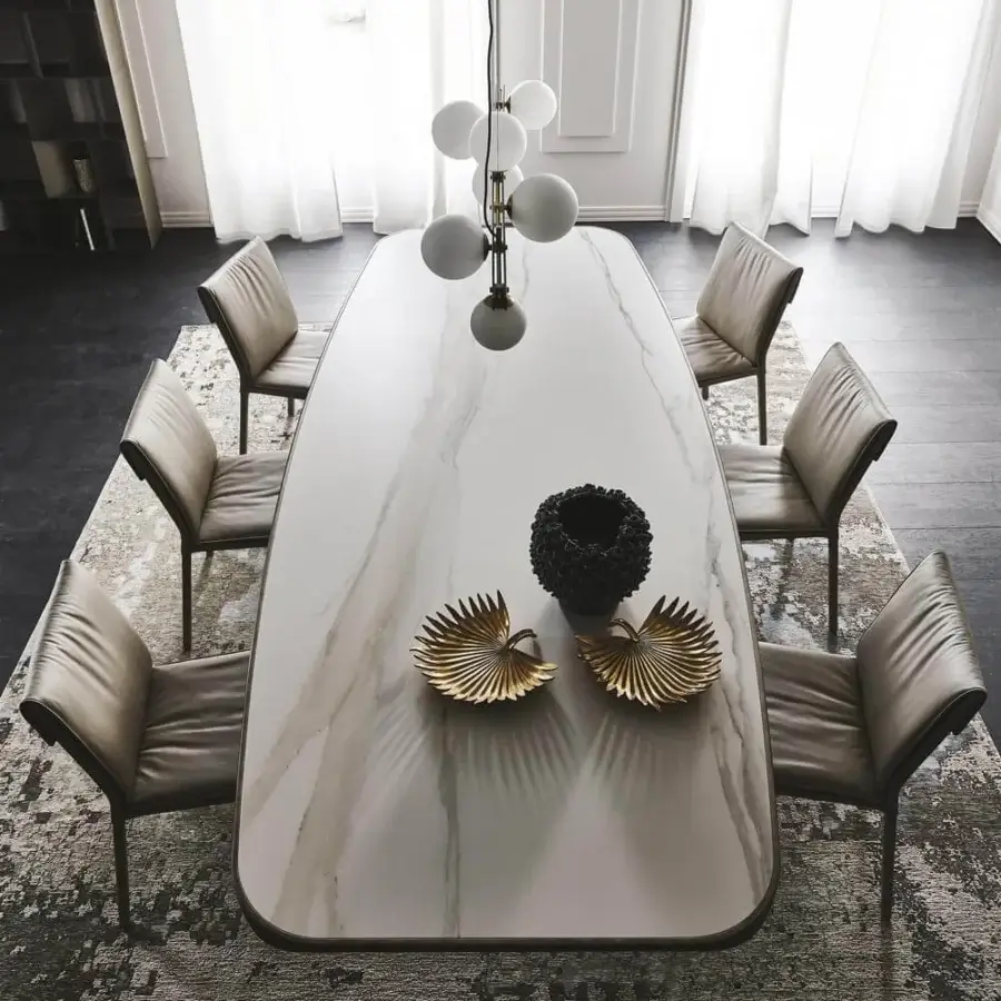 Distinguished Cattelan Italia Stratos Keramik table with titanium embossed steel base and glossy ceramic Marmi top insert exhibiting grey veining