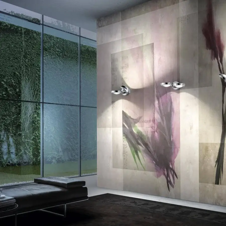 Distinguished Lodes Nautilus wall lamp crafted in polished silver metal with minimalist geometric form